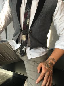 Grey Vest with Chain Button and Black and Red Multimedia Tie by Joanna Coblentz