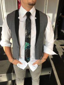 Grey Vest with Black and Green Multimedia Tie by Joanna Coblentz