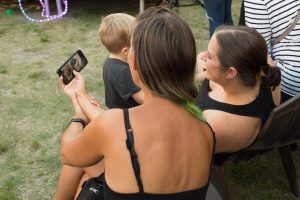 Two Woman Taking a Selfie at Black Amethyst Tattoo Gallery Art Show